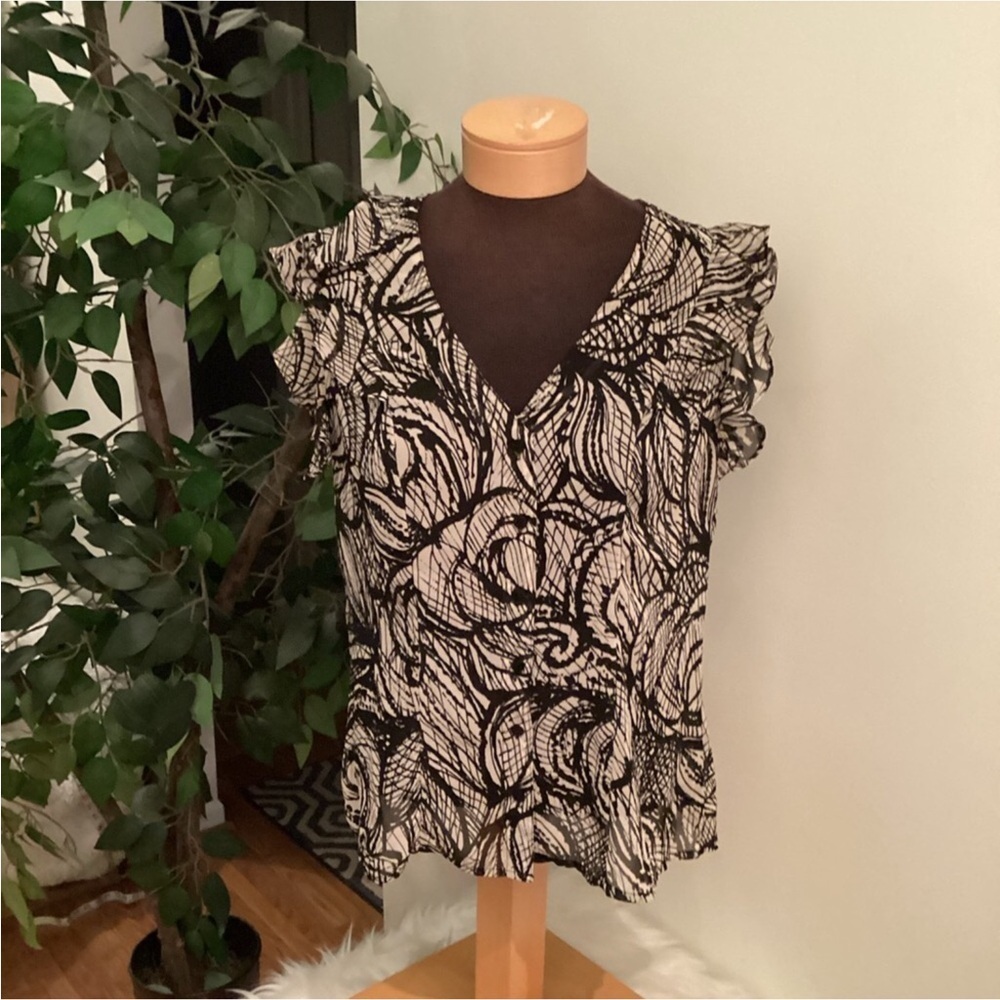 Worthington blouse Woman’s size large black and creamy white no stretch